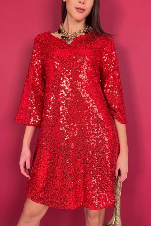 Belle robe avec des paillettes avec une arc derrière une belle robe avec des paillettes avec une arc derrière une belle robe ave