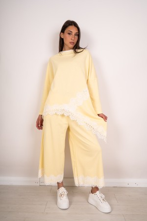 coordinated Brenda Asymmetrical mesh with lace and pants with lace at the coordinated background Brenda asymmetric mesh with lac
