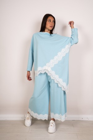 coordinated Brenda Asymmetrical mesh with lace and pants with lace at the coordinated background Brenda asymmetric mesh with lac