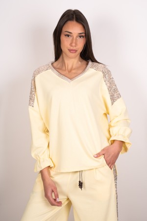 coordinated Sara Maglia and ribbed trousers with coordinated sequins Sara mesh and ribbed trousers with sequin Coo ...