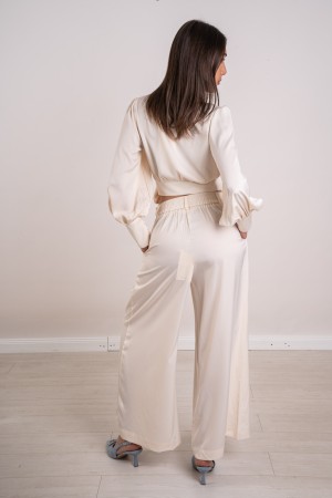 coordonné mon chemisier et un pantalon satiné avec l'arc 