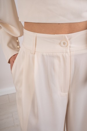 coordonné mon chemisier et un pantalon satiné avec l'arc 