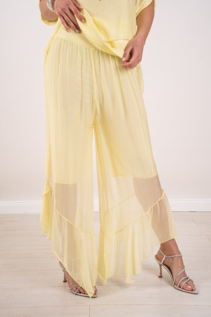coordinó Hawaii en la blusa de seda con lentejuelas y pantalones con coordinados hawaii volante en blusa de seda con lentejuelas