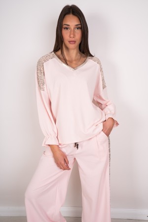 coordinó a Sara Maglia y pantalones acanalados con lentejuelas coordinadas y pantalones acanalados con lentejuelas ...