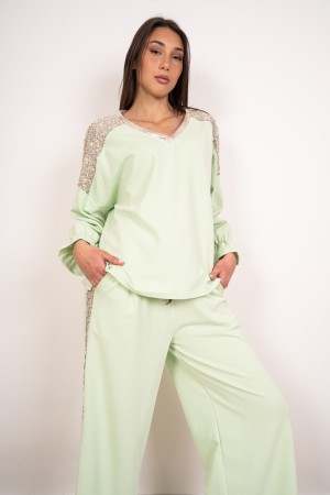 coordinó a Sara Maglia y pantalones acanalados con lentejuelas coordinadas y pantalones acanalados con lentejuelas ...
