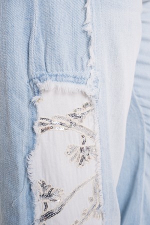 Jeans Rachele con aperture in tessuto a contrasto e strass sul fondo  Jeans Rachele con aperture in tessuto a contrasto e str...
