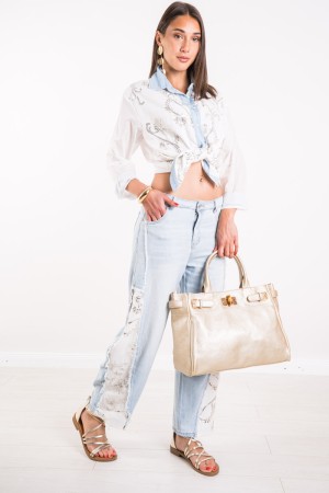 Jeans Rachel with contrasting fabric openings and rhinestones on the bottom Jeans Rachel with contrasting fabric openings and ..
