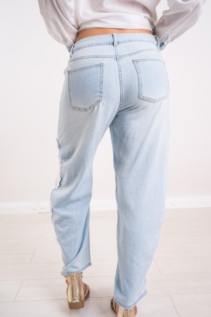 Jeans Rachel con aberturas de tela en contraste y pedrería en los pantalones vaqueros de abajo Rachel con aberturas de tela en c