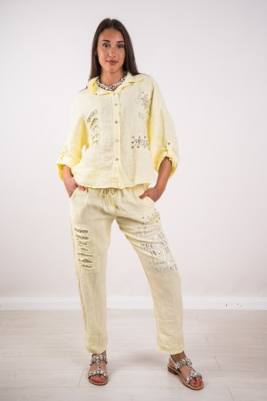 Coordinato Cherie con decori in strass e pailletes Coordinato Cherie con decori in strass e pailletes Coordinato Cherie con d...