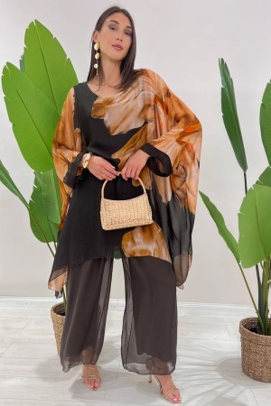 Coordinato Marocco con stampa floreale e pantalone tinta unita Coordinato Marocco con stampa floreale e pantalone tinta unita...