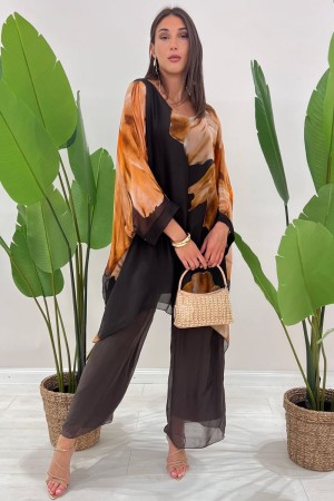 Coordinato Marocco con stampa floreale e pantalone tinta unita Coordinato Marocco con stampa floreale e pantalone tinta unita...
