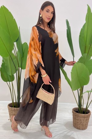 Coordinato Marocco con stampa floreale e pantalone tinta unita Coordinato Marocco con stampa floreale e pantalone tinta unita...