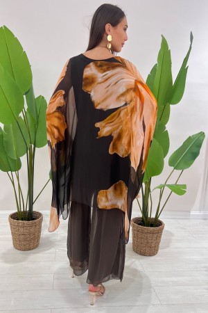 Coordinato Marocco con stampa floreale e pantalone tinta unita Coordinato Marocco con stampa floreale e pantalone tinta unita...