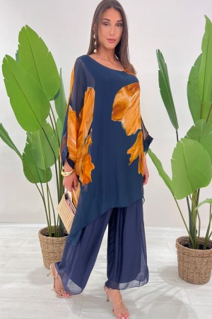 Coordinato Marocco con stampa floreale e pantalone tinta unita Coordinato Marocco con stampa floreale e pantalone tinta unita...