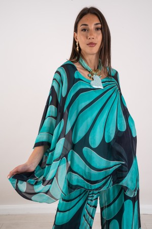 coordinated Veronica in silk blouse and fantasy pants 