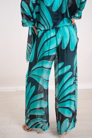 coordinated Veronica in silk blouse and fantasy pants 