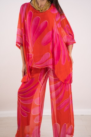 coordinated Veronica in silk blouse and fantasy pants 
