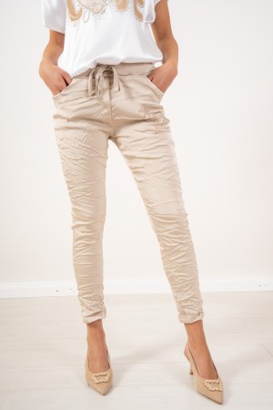 pantalone palma a sigaretta con dettaglio disegno strass  pantalone palma a sigaretta con dettaglio disegno strass  pantalone...