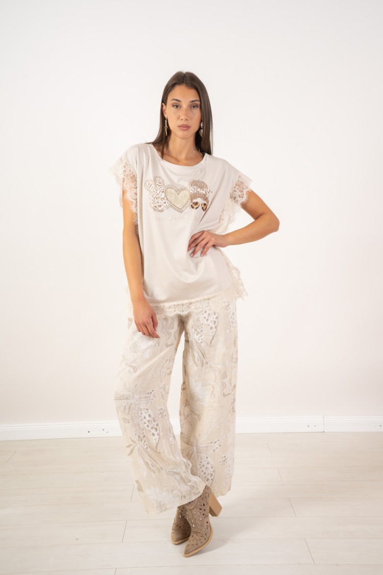 pantalone sakira in lino con fantasia fiori  pantalone sakira in lino con fantasia fiori  pantalone sakira in lino con fantas...