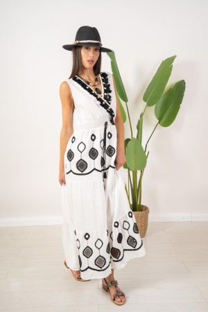 vestido largo de manzana con decoración de borla y vestido negro de manzana de franjas negras con decoraciones de borla y franja