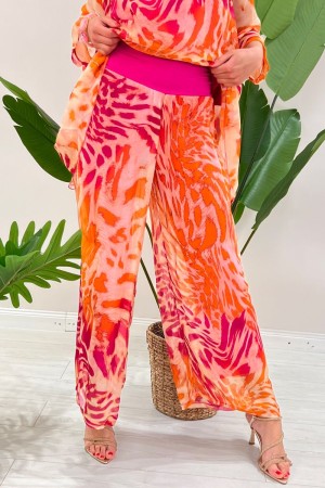 Coordinato Ginevra fantasia Animalier blusa e pantalone  Coordinato Ginevra fantasia Animalier blusa e pantalone  Coordinato ...