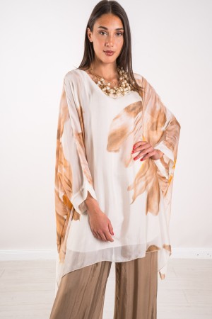 Coordinato Marocco con stampa floreale e pantalone tinta unita Coordinato Marocco con stampa floreale e pantalone tinta unita...