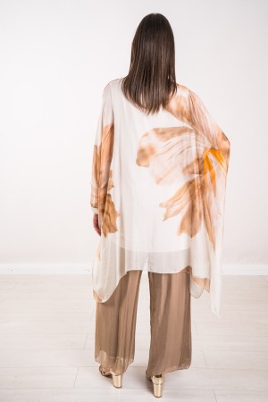 Coordinato Marocco con stampa floreale e pantalone tinta unita Coordinato Marocco con stampa floreale e pantalone tinta unita...