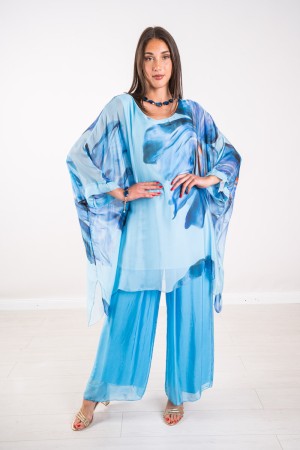 Coordinato Marocco con stampa floreale e pantalone tinta unita Coordinato Marocco con stampa floreale e pantalone tinta unita...