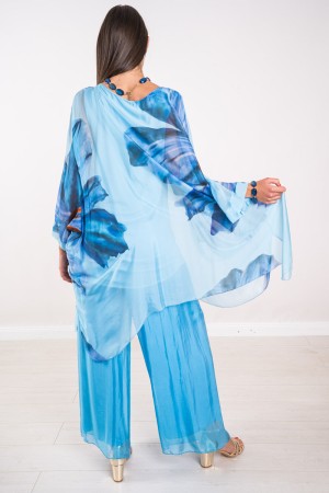 Coordinato Marocco con stampa floreale e pantalone tinta unita Coordinato Marocco con stampa floreale e pantalone tinta unita...