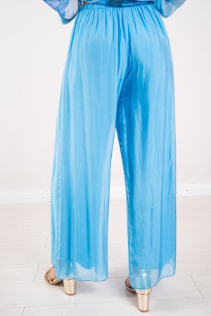 Coordinato Marocco con stampa floreale e pantalone tinta unita Coordinato Marocco con stampa floreale e pantalone tinta unita...