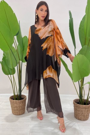 Coordinato Marocco con stampa floreale e pantalone tinta unita Coordinato Marocco con stampa floreale e pantalone tinta unita...