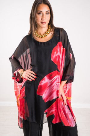 Coordinato Marocco con stampa floreale e pantalone tinta unita Coordinato Marocco con stampa floreale e pantalone tinta unita...