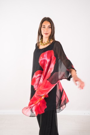 Coordinato Marocco con stampa floreale e pantalone tinta unita Coordinato Marocco con stampa floreale e pantalone tinta unita...