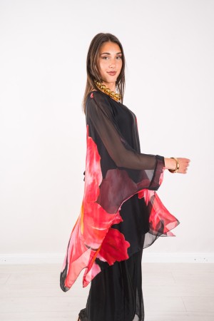 Coordinato Marocco con stampa floreale e pantalone tinta unita Coordinato Marocco con stampa floreale e pantalone tinta unita...