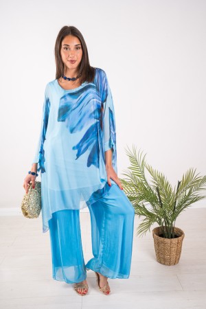 Coordinato Marocco con stampa floreale e pantalone tinta unita Coordinato Marocco con stampa floreale e pantalone tinta unita...