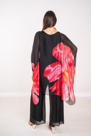 Coordinato Marocco con stampa floreale e pantalone tinta unita Coordinato Marocco con stampa floreale e pantalone tinta unita...
