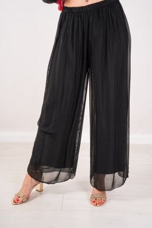 Coordinato Marocco con stampa floreale e pantalone tinta unita Coordinato Marocco con stampa floreale e pantalone tinta unita...