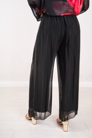 Coordinato Marocco con stampa floreale e pantalone tinta unita Coordinato Marocco con stampa floreale e pantalone tinta unita...