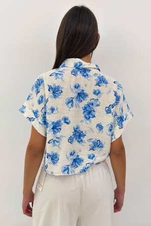 Camicia Blue con nodo in vita e fantasia floreale Camicia Blue con nodo in vita e fantasia floreale Camicia Blue con nodo in ...