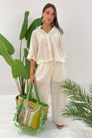 Ibiza coordonné en coton léger avec dentelle et macramé Détails Ibiza en coton clair avec des détails en dentelle et ...
