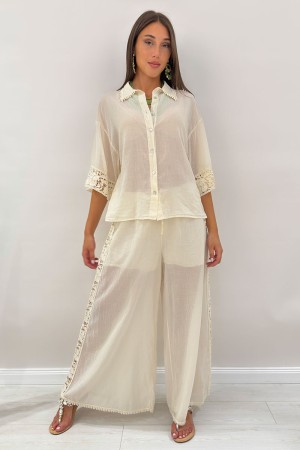 Coordinato Ibiza in cotone leggero con dettagli in pizzo e macramè Coordinato Ibiza in cotone leggero con dettagli in pizzo e...