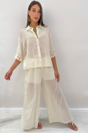 Ibiza coordonné en coton léger avec dentelle et macramé Détails Ibiza en coton clair avec des détails en dentelle et ...