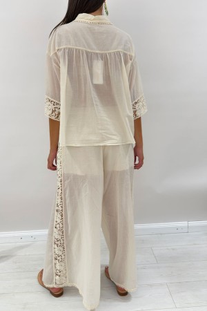 Coordinato Ibiza in cotone leggero con dettagli in pizzo e macramè Coordinato Ibiza in cotone leggero con dettagli in pizzo e...