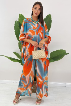 Coordinato Romi in seta blusa e pantalone con fantasia astratta Coordinato Romi in seta blusa e pantalone con fantasia astrat...