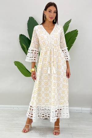 Abito lungo Bahamas in pizzo crochet traforato oro e collo arricchito con nappe Abito lungo Bahamas in pizzo crochet traforat...