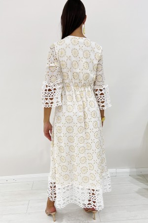 Abito lungo Bahamas in pizzo crochet traforato oro e collo arricchito con nappe Abito lungo Bahamas in pizzo crochet traforat...