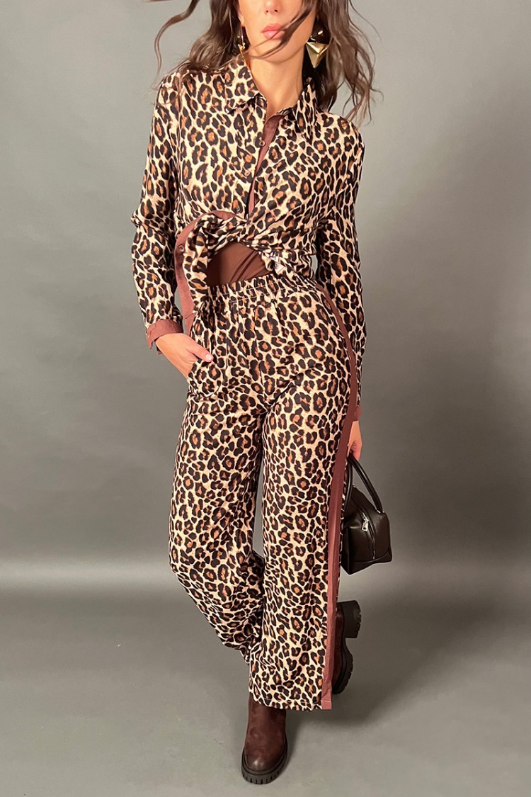 Pantalone Gersy leopardato con strisce laterali Pantalone Gersy leopardato con strisce laterali Pantalone Gersy leopardato co...