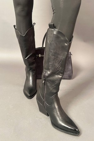 Texaner Boot Four in Leder mit Ferse Texano Boot Vier Leder mit Ferse Texano Boot Vier Leder mit Ferse