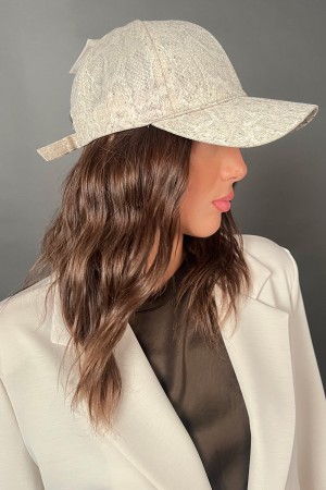 Cappello Marilenacon strass e visiera effetto animalier Cappello Marilenacon strass e visiera effetto animalier Cappello Mari...
