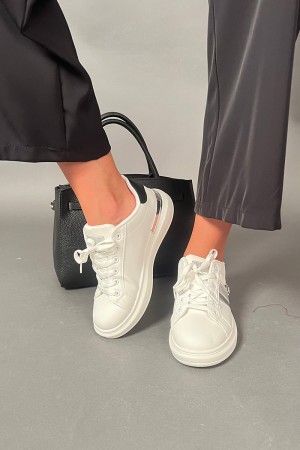 Sneakers Ellen Court white with raised sole and glitter details White Ellen Court sneakers with raised sole and details... 